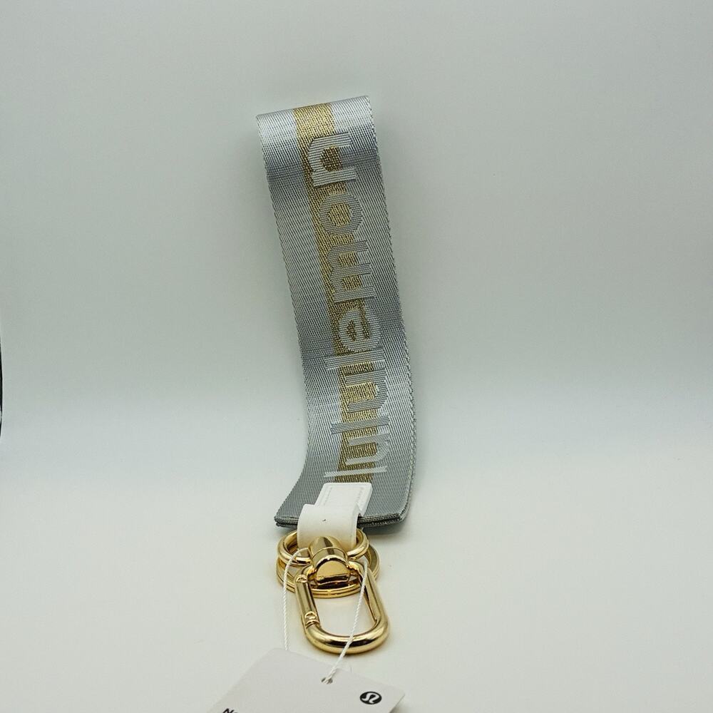 Lululemon Never Lost Keychain Vapor Gold Strap Metal Fabric New